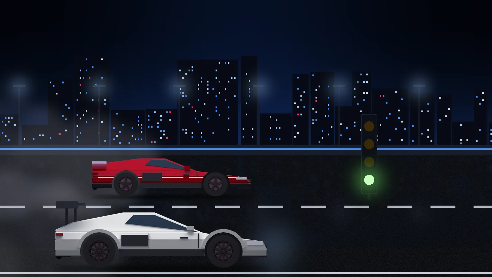 Two cars smoke their tires as the light turns green